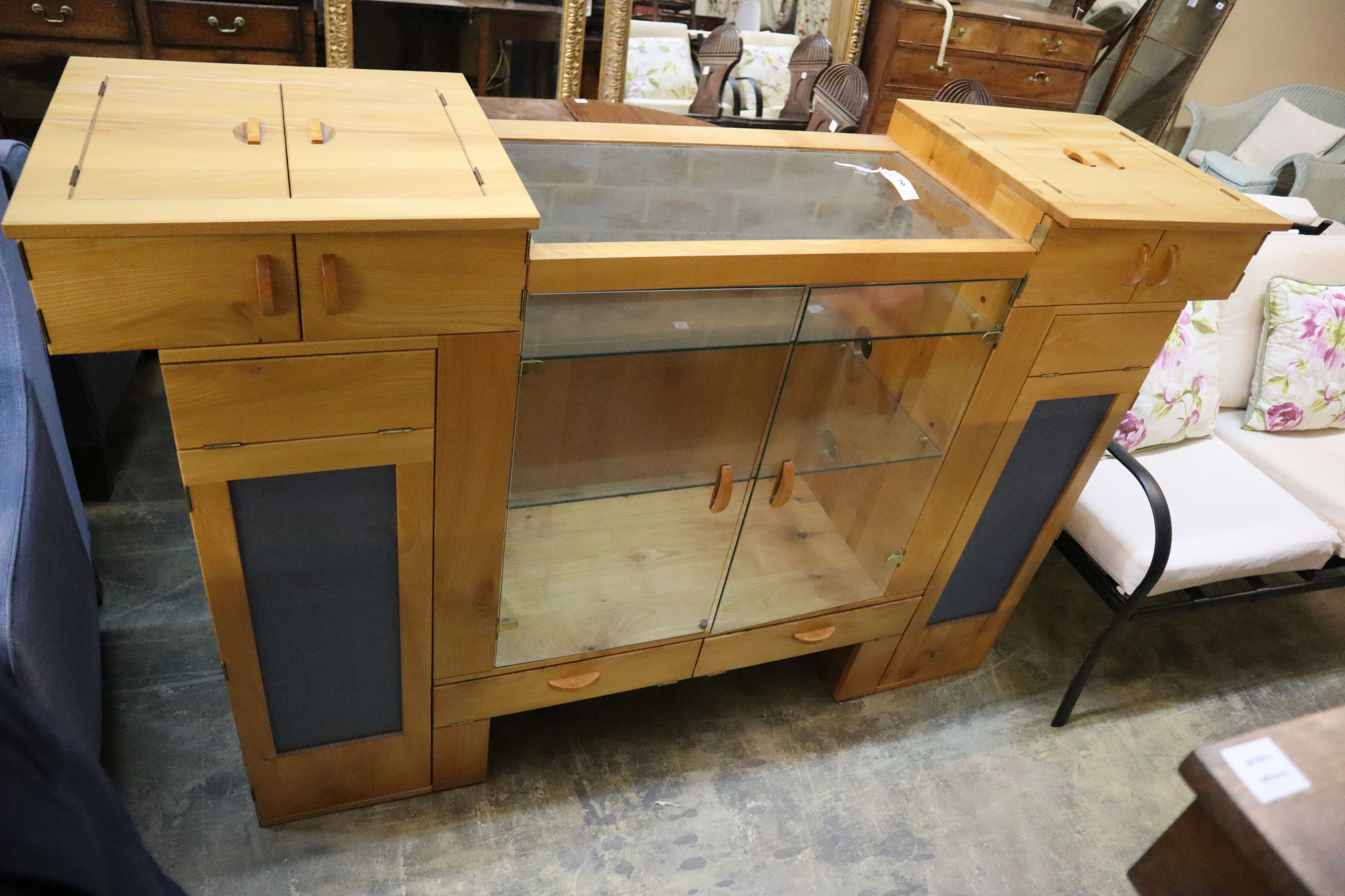 A bespoke cherrywood and wych elm combined display/audio cabinet by John Wyndham, width 175cm, depth 47cm, height 115cm